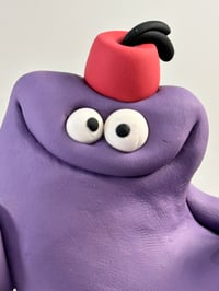 Image 2 of Purple thing with a fez