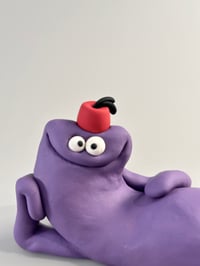 Image 6 of Purple thing with a fez