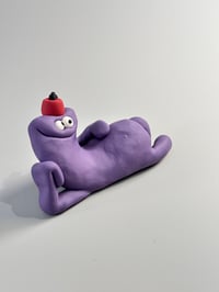 Image 4 of Purple thing with a fez