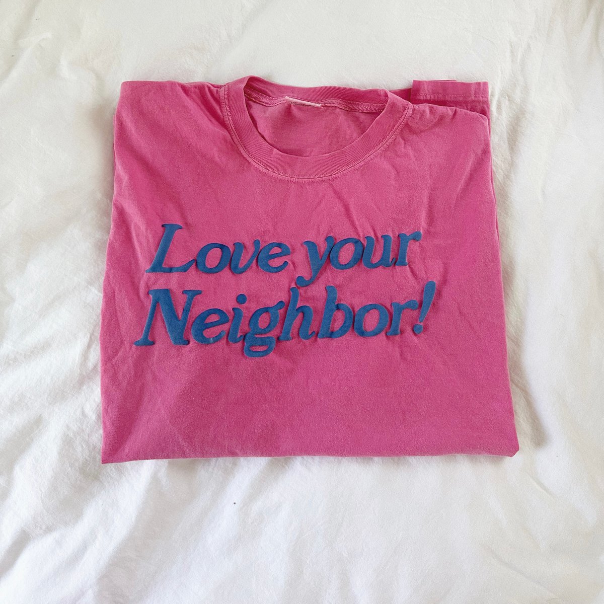 Image of pink / blue tee