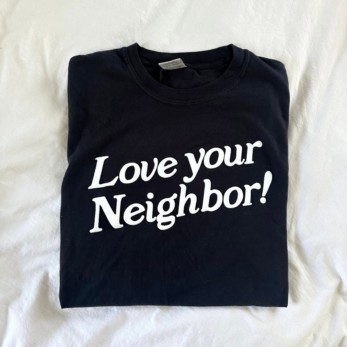 Image of black tee