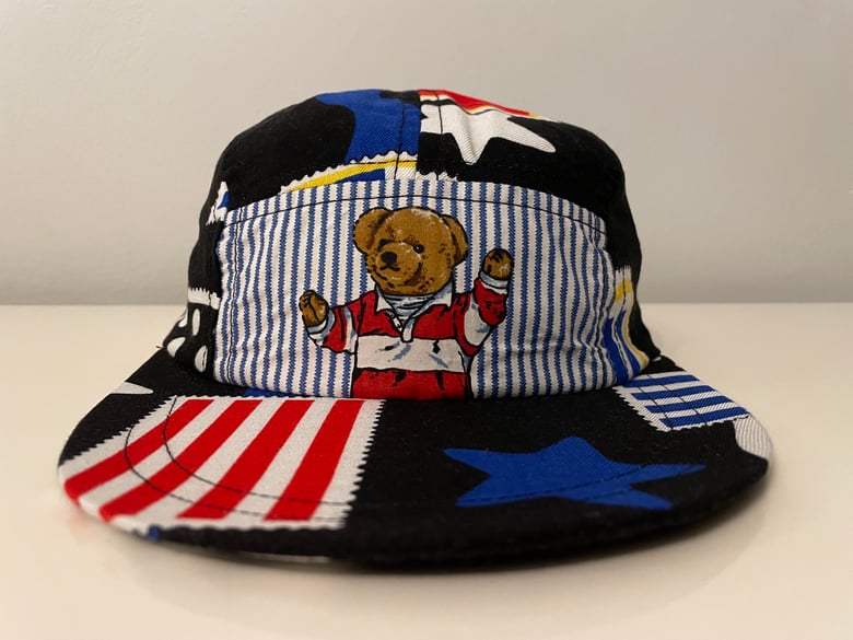 Image of World Stamp Print/Rugby Teddy Bear Long Bill Hat