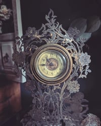 Image 4 of Filigree angel clock and candlabra