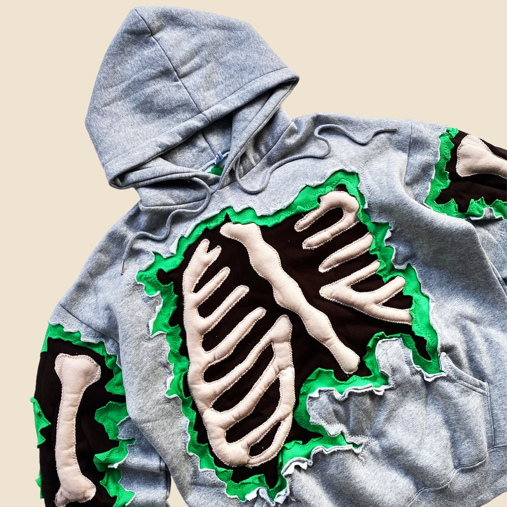 REWORKED CRACKED 3D SKELETON HOODIE SIZE L