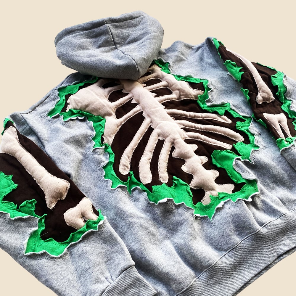 REWORKED CRACKED 3D SKELETON HOODIE SIZE L