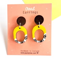 Yellow and black wooden oval dangle earrings