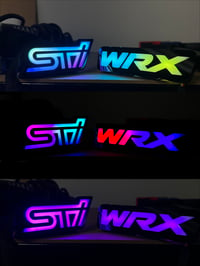 Image 1 of RGB / RGB Flowing Front Grille WRX / STI Emblems