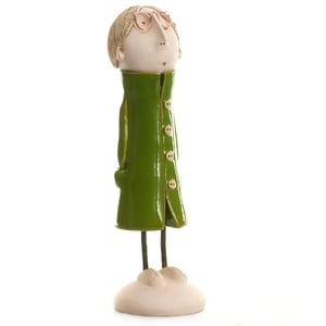Image of Quirky Couple in Green | Long Haired Man with Lady with Buns