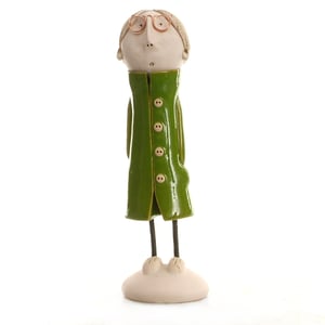 Image of Quirky Couple in Green | Long Haired Man with Lady with Buns