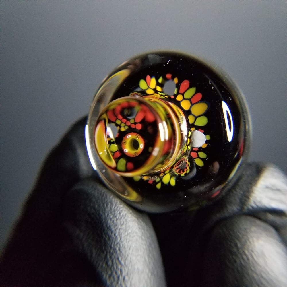 Image of 31mm Fat Cap Rasta Wormhole 