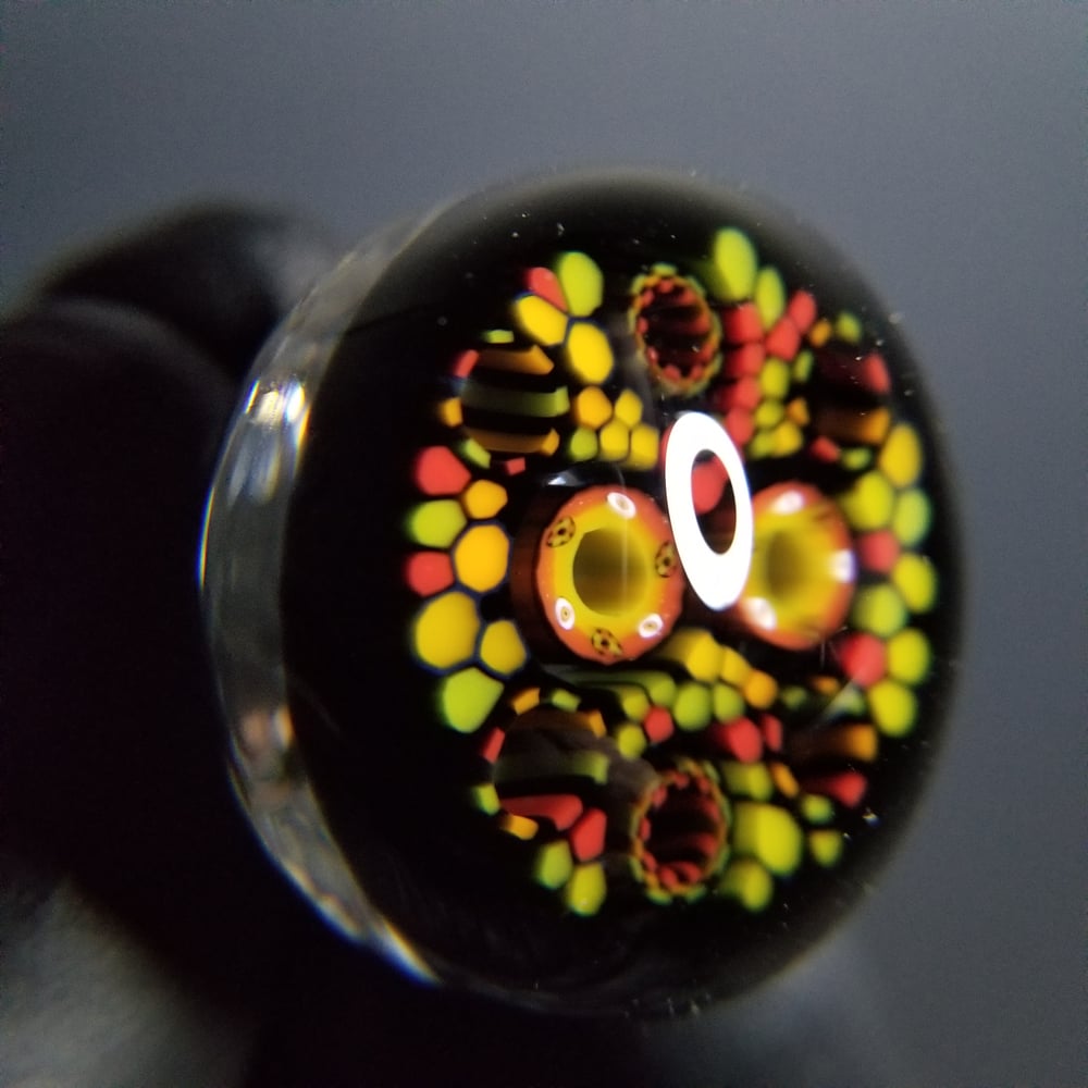 Image of 31mm Fat Cap Rasta Wormhole 