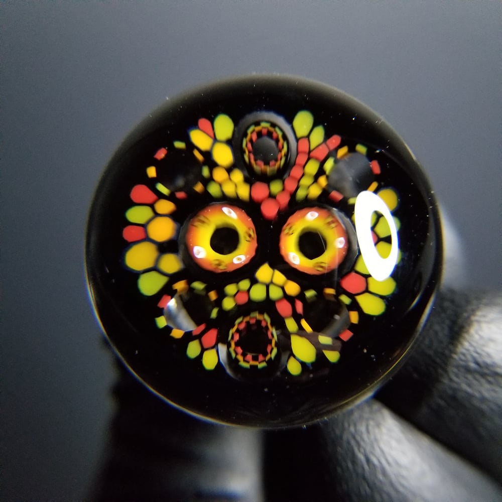 Image of 31mm Fat Cap Rasta Wormhole 