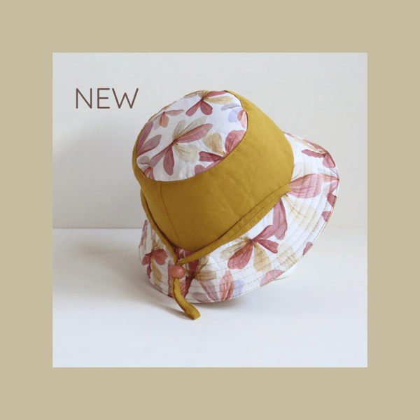 Image of Gorro reversible "FLORAL MOSTAZA"