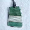 Contemporary Handmade Ceramic Necklace, Textured Black Porcelain Clay, Green Glaze on cord