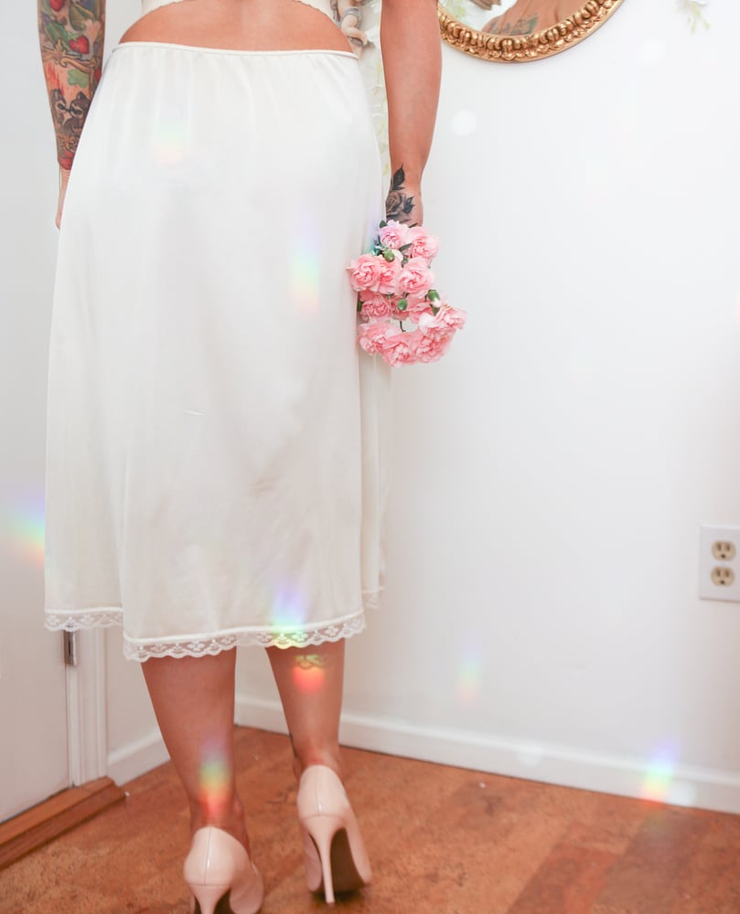 Image of Vintage Late 1960s Warner's Angelic Ivory Half Slip (Large)