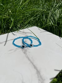 Light Blue Seed Evil Eye 