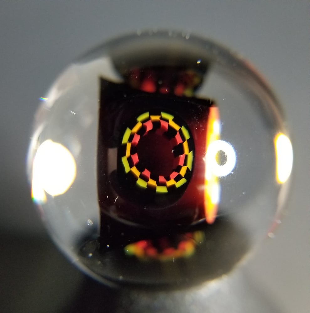 Image of 39mm Rasta Eye Vortex with Rasta Checkerboard satellites 