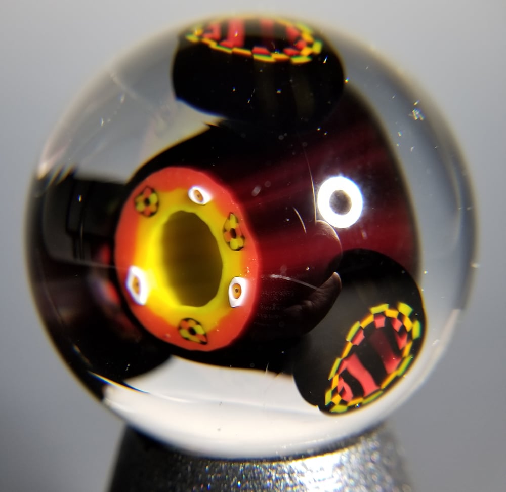 Image of 39mm Rasta Eye Vortex with Rasta Checkerboard satellites 