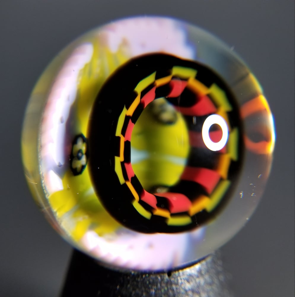 Image of 39mm UV marble with Rasta Checkerboard and Peyote Hills milli