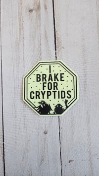 Image 2 of I Brake For Cryptids Glow in the Dark Sticker