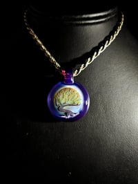 Image 1 of Bonsai tree pendant backed with royal jelly. 