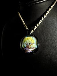 Image 1 of Bonsai tree pendant backed with galaxy. 