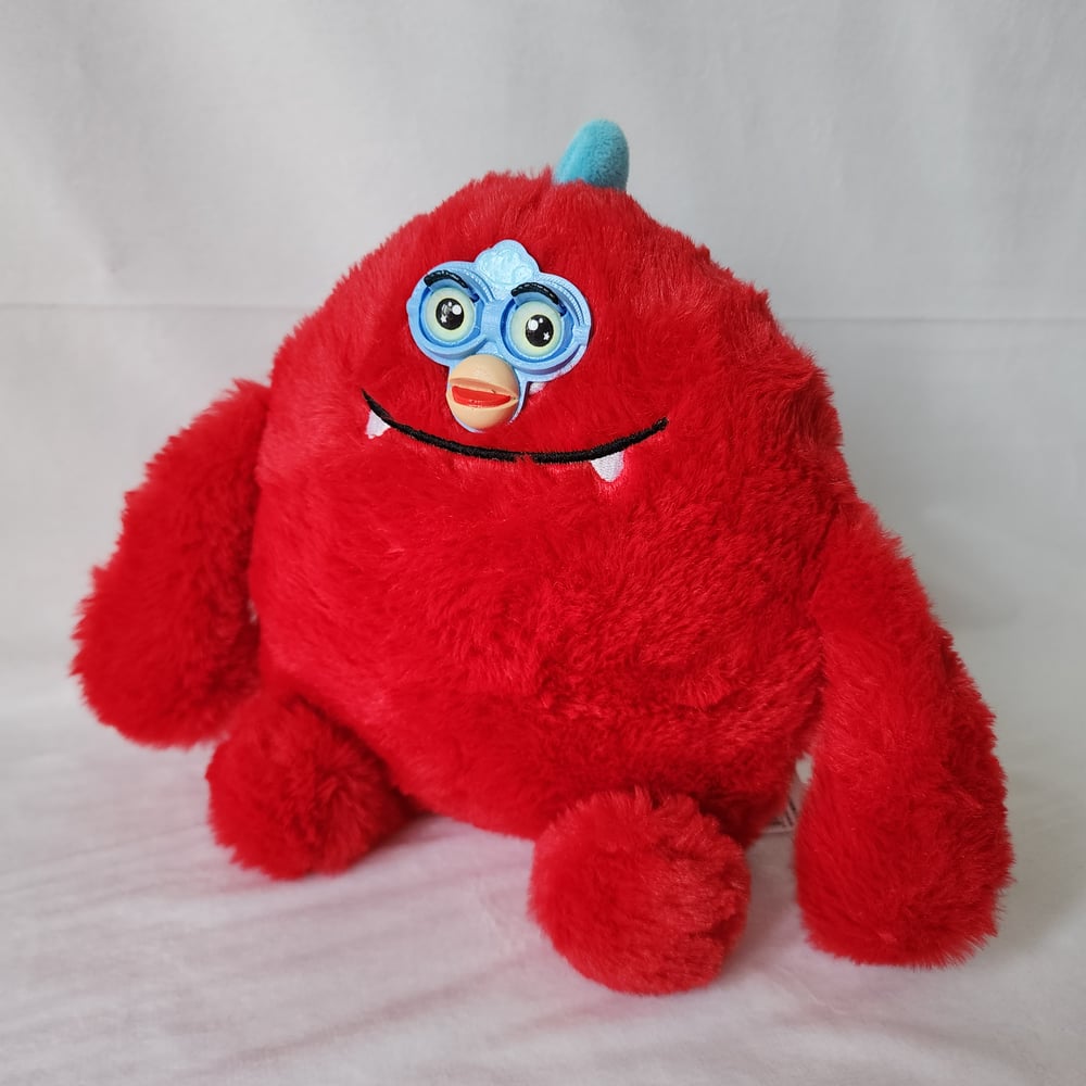 Image of Red furby monsyer