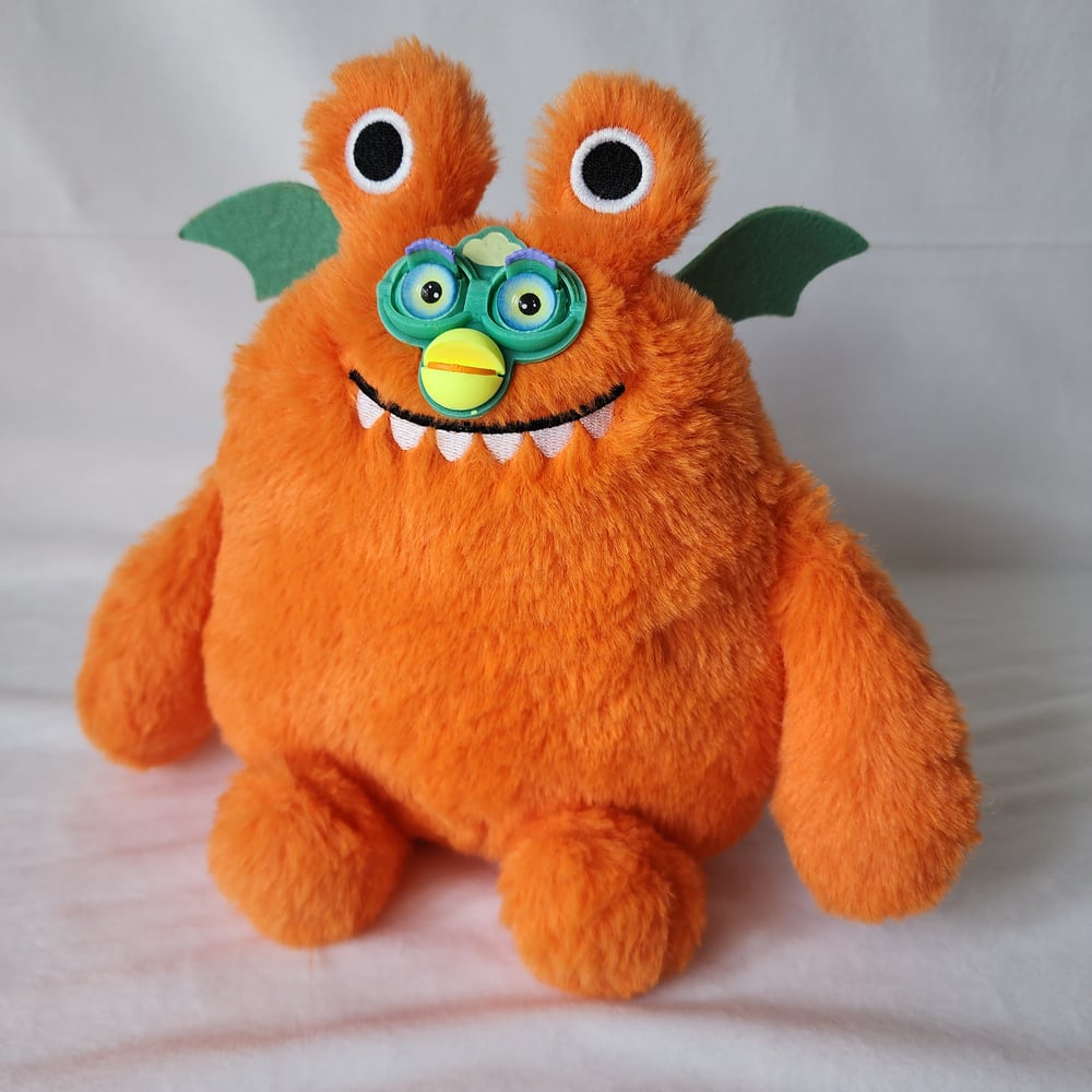 Image of Orange furby monster