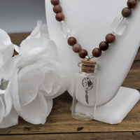 Image 2 of Dreamcatcher Charm Jar Necklace. 