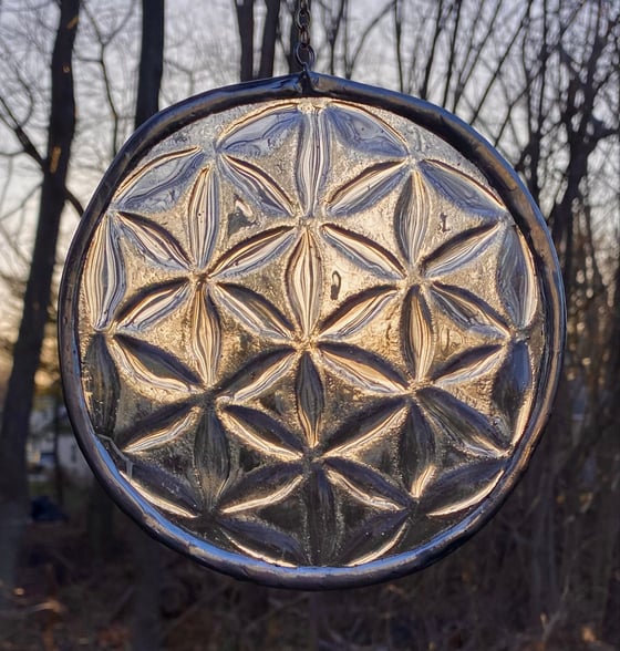 Image of Slumped Flower of Life glass circle