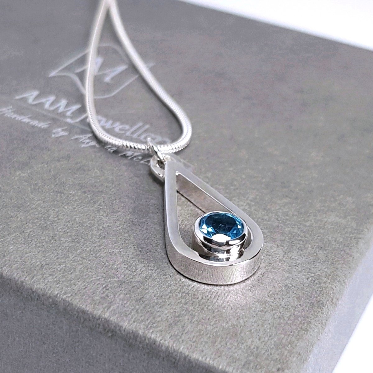 Sterling Silver Tear Drop Blue Topaz Pendants Sterling Silver Tear Drop Blue Topaz Pendants