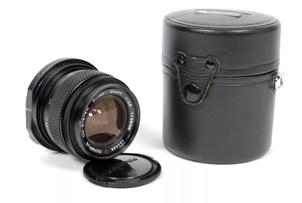 Image of Olympus OM Shift 35mm F2.8 lens with case (#8160)