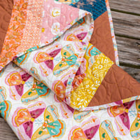 Image 3 of Retro Curiosities - adventureland throw quilt featuring Curio fabrics 