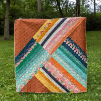 Image 1 of Retro Curiosities - adventureland throw quilt featuring Curio fabrics 