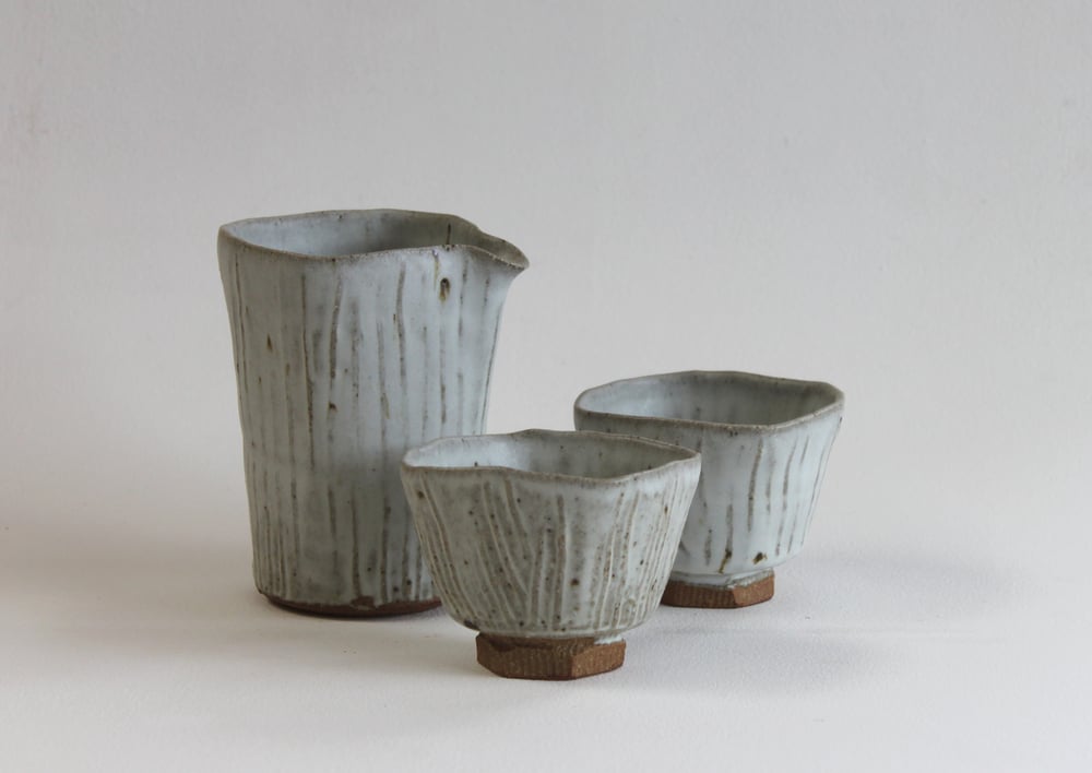 Image of Pourer and cup set.