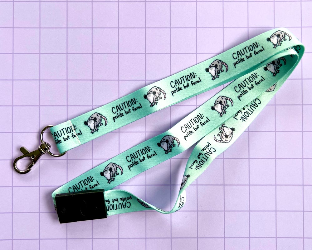 Image of Polite but feral possum lanyard