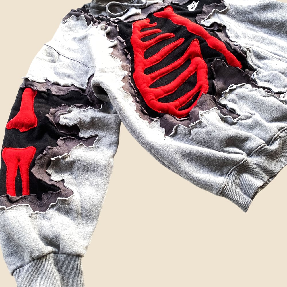 REWORKED NIKE CRACKED 3D PUFF RED SKELETON GREY HOODIE SIZE M