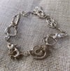 ‘Objects hold meaning’ molten silver bracelet