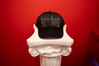 Pretty Trapper trucker hat