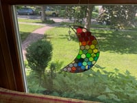 Crescent moon with rainbow making crystal