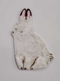 Image 1 of Sitting bunny, eyes closed 