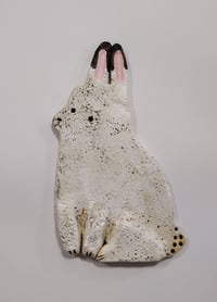 Image 2 of Sitting bunny, eyes closed 
