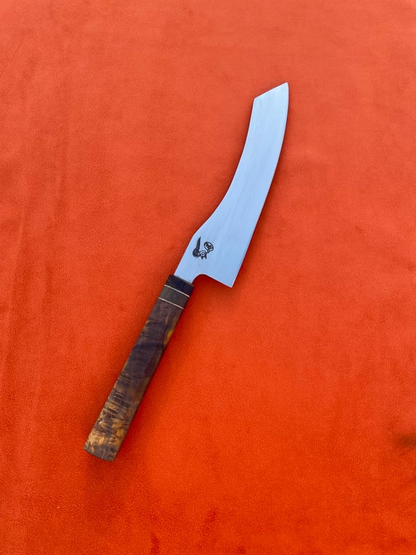 Image of Curved chefs knife