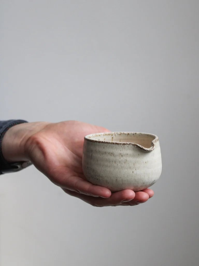 Image of pouring jug in dune