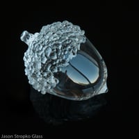 Image 2 of tiny solid clear glass acorn  ( 2 inch )