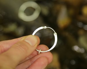 Image of Hag stone hoop earrings