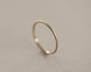 Image of 9ct yellow gold thin milled ring