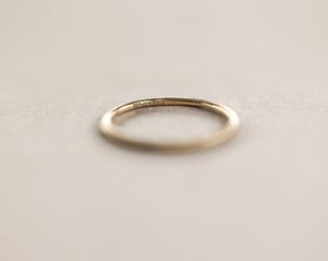 Image of 9ct yellow gold thin milled ring