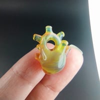 Image 1 of Miniature OG yellow elvis anatomical heart pendant 