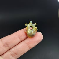 Image 2 of Miniature OG yellow elvis anatomical heart pendant 